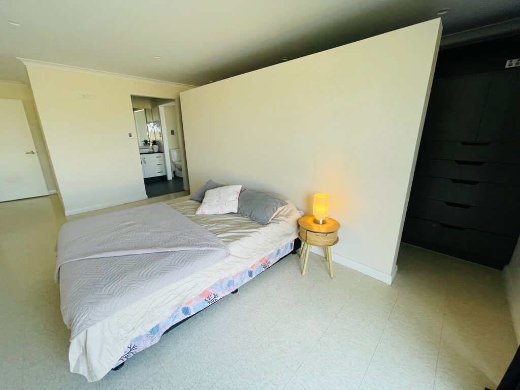 Community Living Association Baltic Ridge main bedroom and bathroom view.